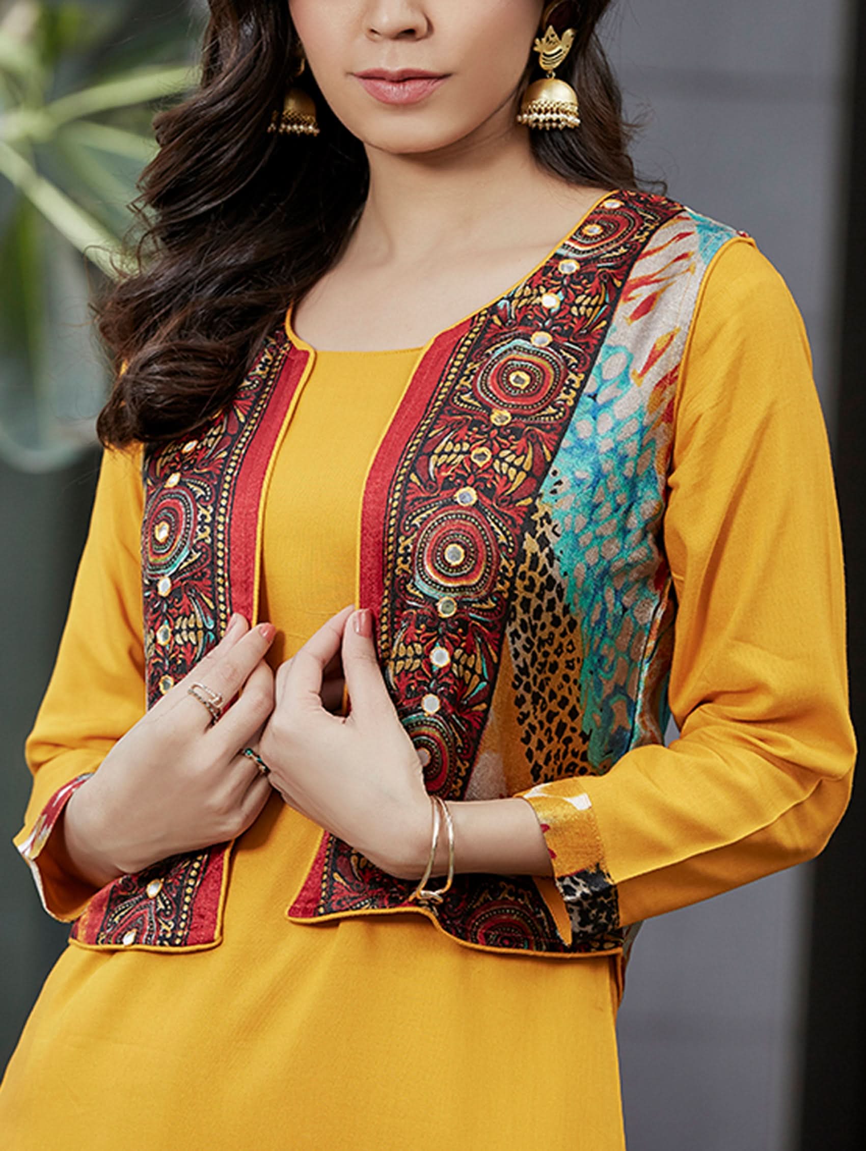 Mustard printed kurta set with embellished jacket-style yoke and dhoti pants