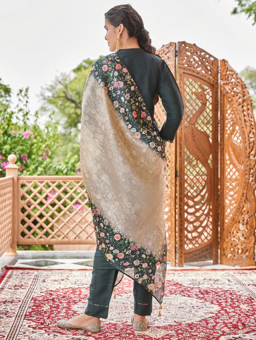 Dark teal kurta with floral embroidered dupatta and matching slim trousers, back view