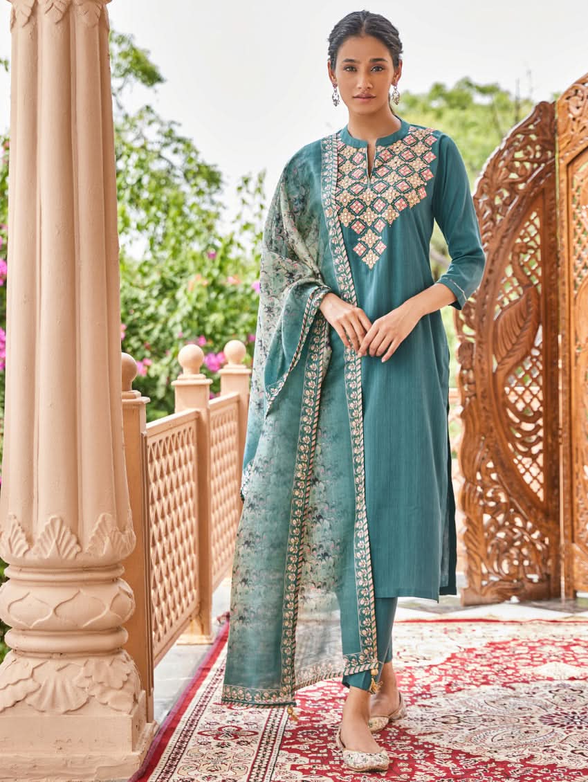 Teal embroidered silk suit set with matching pants and draped dupatta
