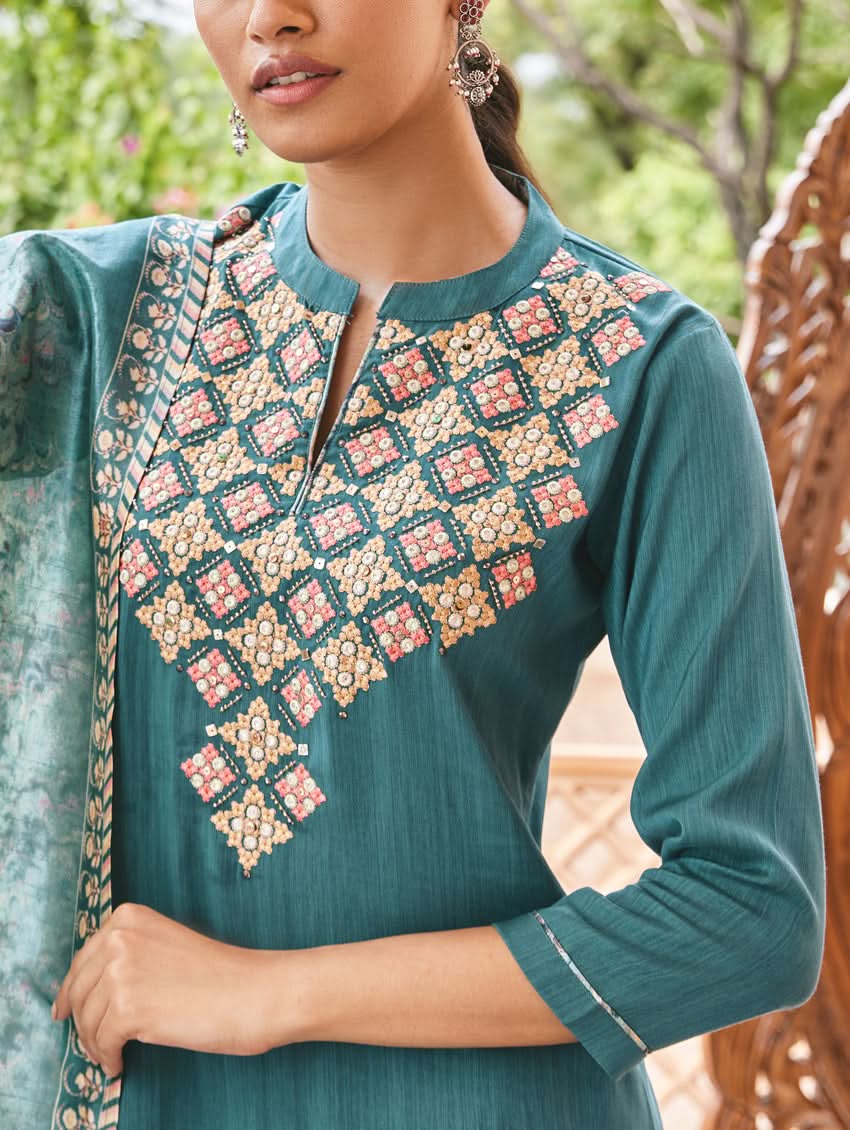 Teal silk kurta with long sleeves and ornate geometric embroidered yoke panel