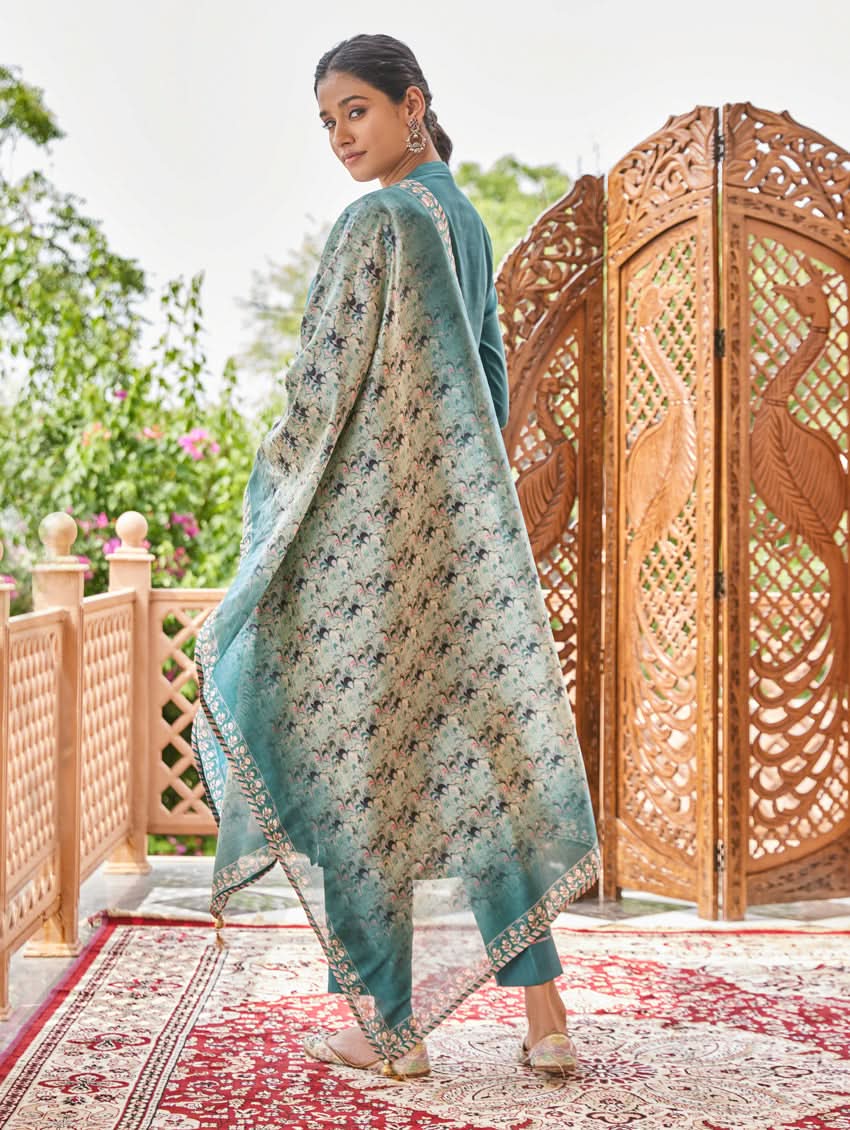 Teal embroidered silk dupatta over kurta with matching pants, side view