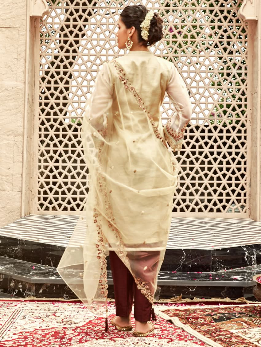Cream embroidered long kurta with sheer back overlay and maroon slim pants