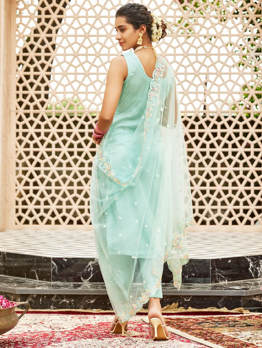 Light teal embroidered net suit set with sheer dupatta and sleeveless kurta