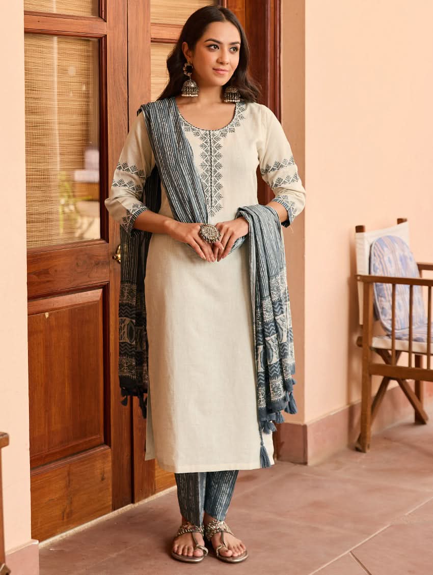 Embroidered cream tunic and blue striped pants with matching blue dupatta
