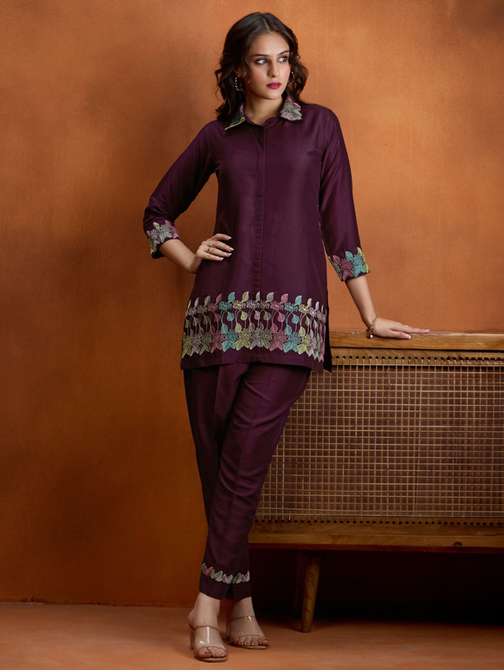 Dark maroon embroidered tunic top and matching trousers with floral hem detailing