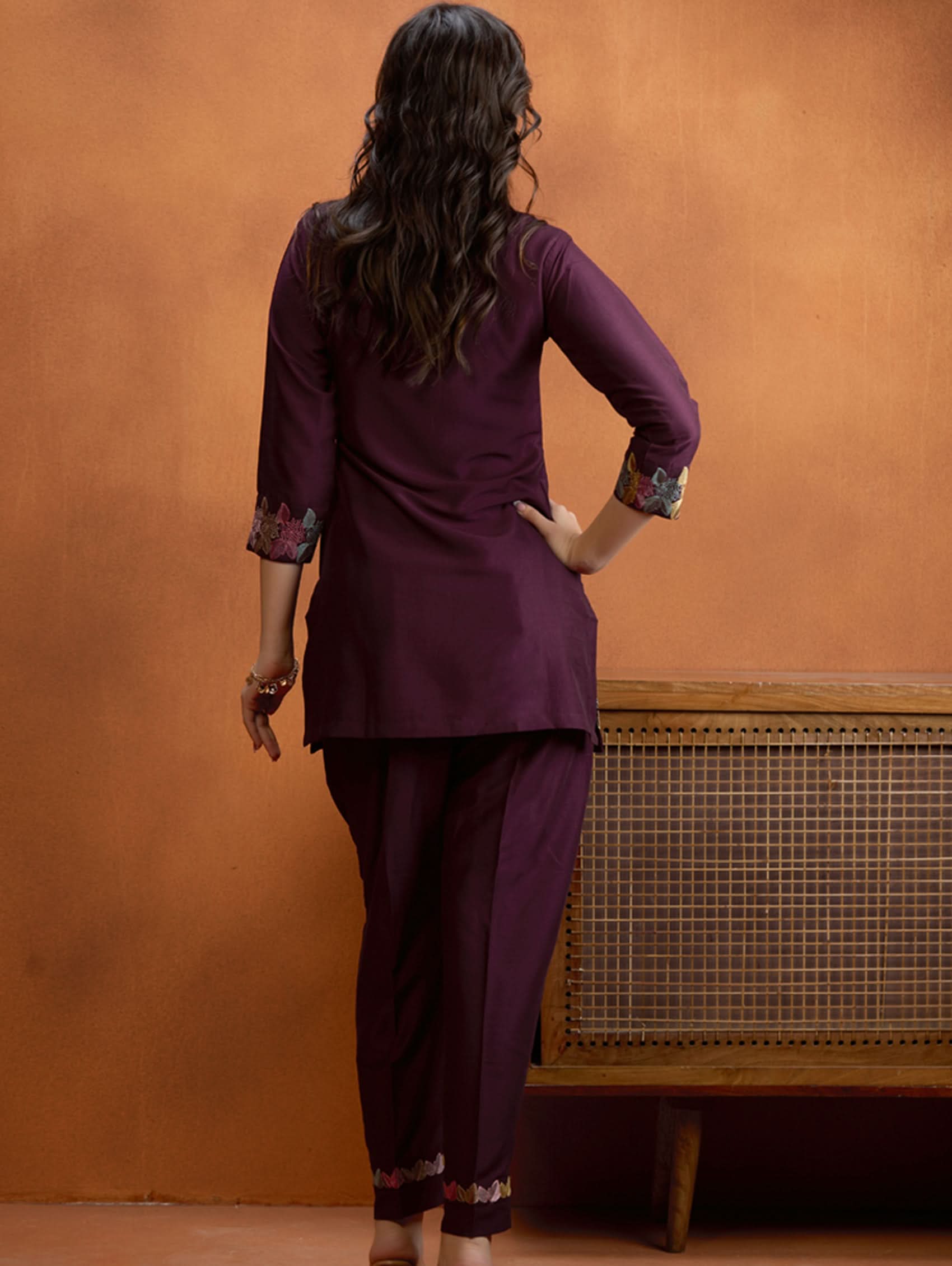 Dark maroon embroidered tunic and trousers set with floral cuffs at sleeves
