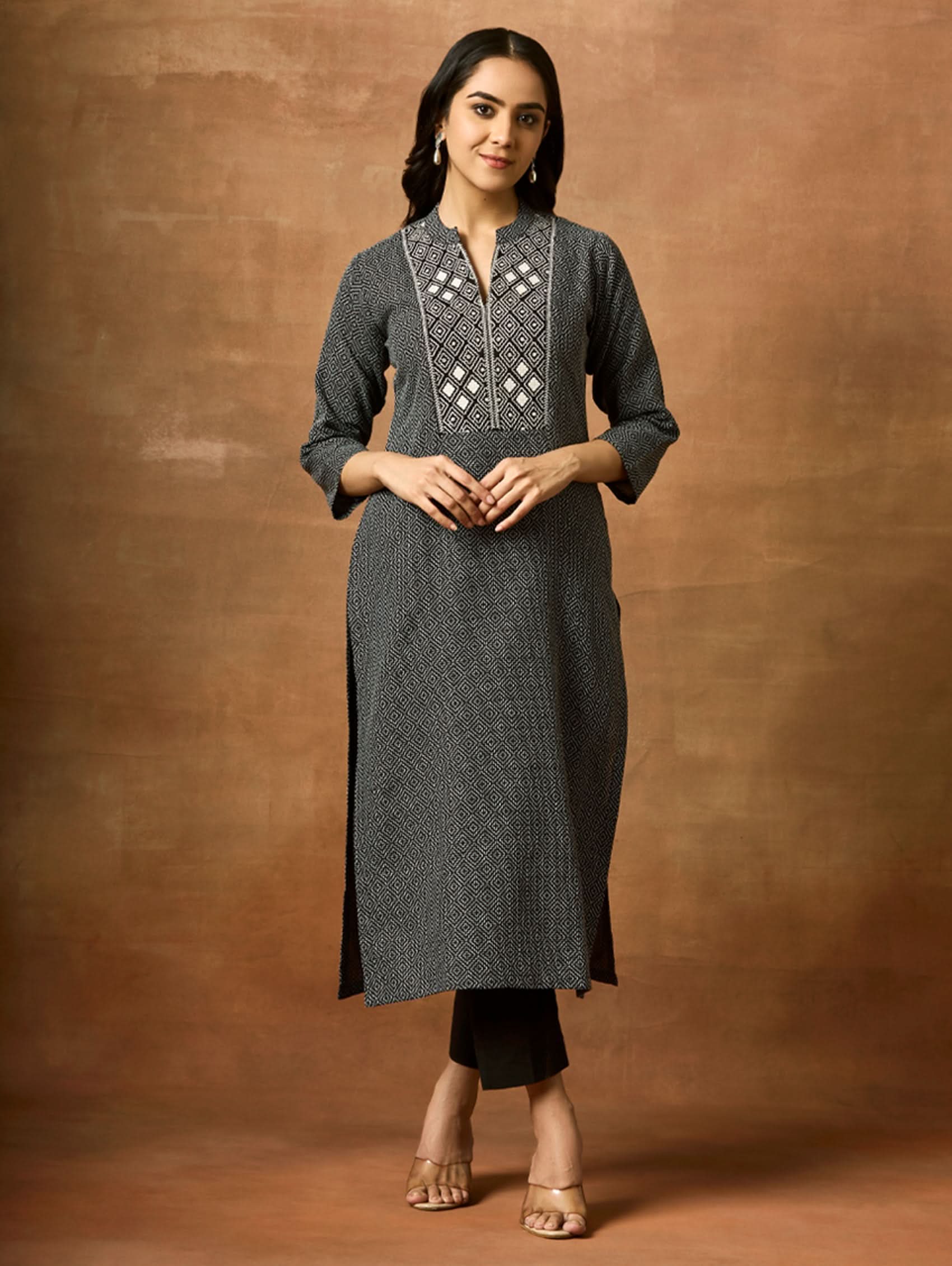 Embroidered cotton kurta in dark charcoal with geometric pattern at yoke and front