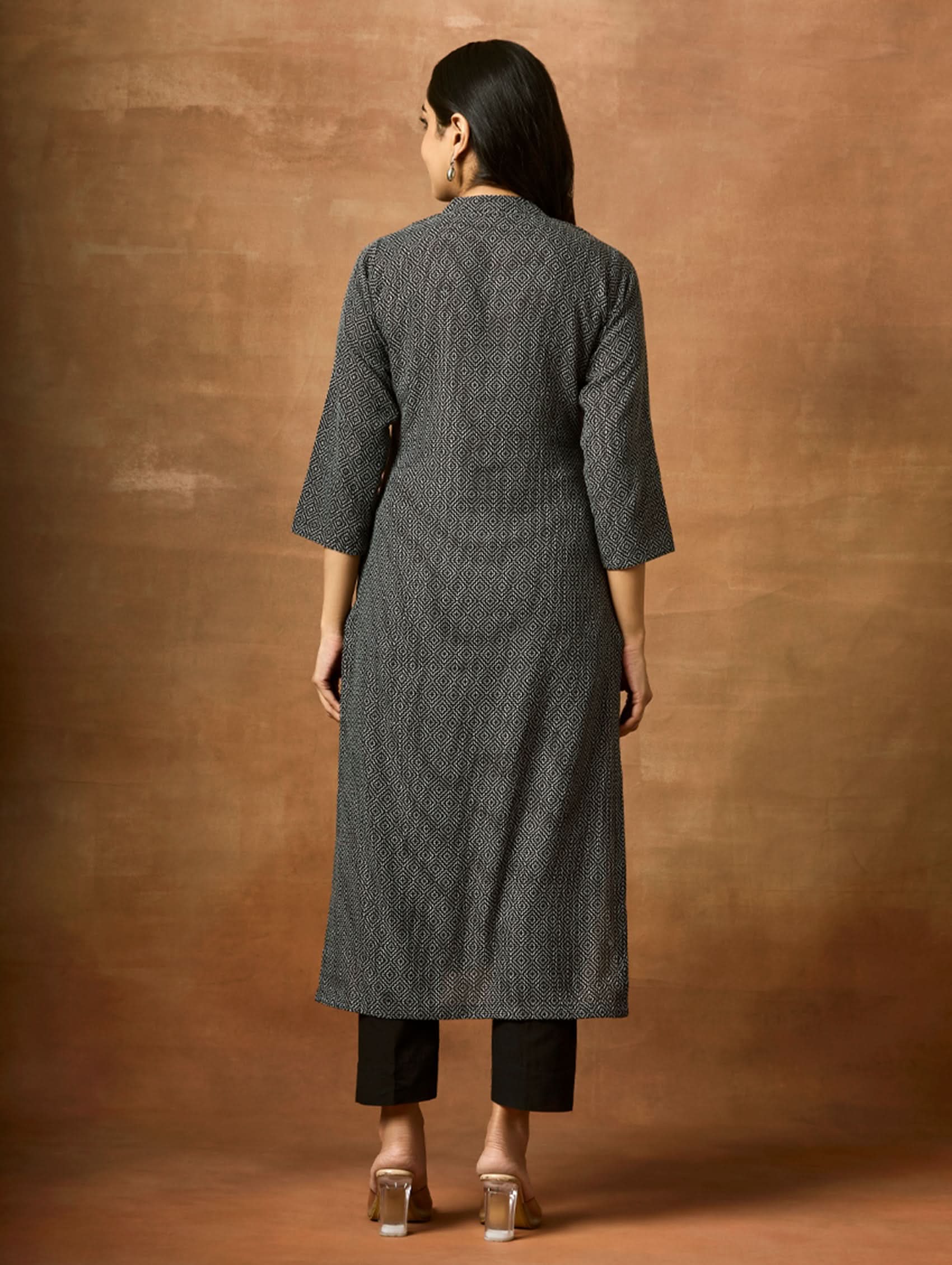 Embroidered cotton kurta back view in dark charcoal with three-quarter sleeves