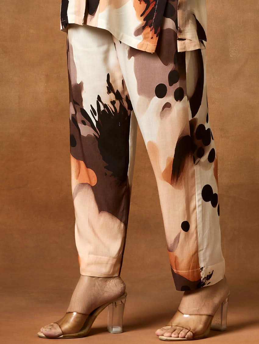 Camouflage-patterned pants with a brown background