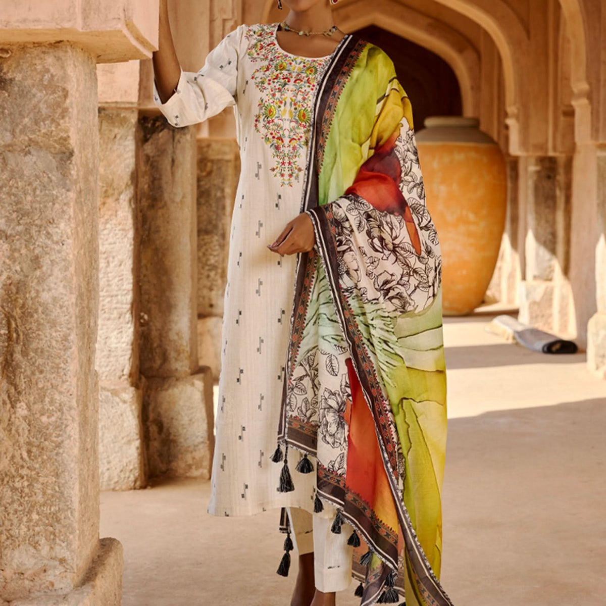 Elegant unstitched cotton flex suit set, designed with a striking contrast mix-and-match yoke.