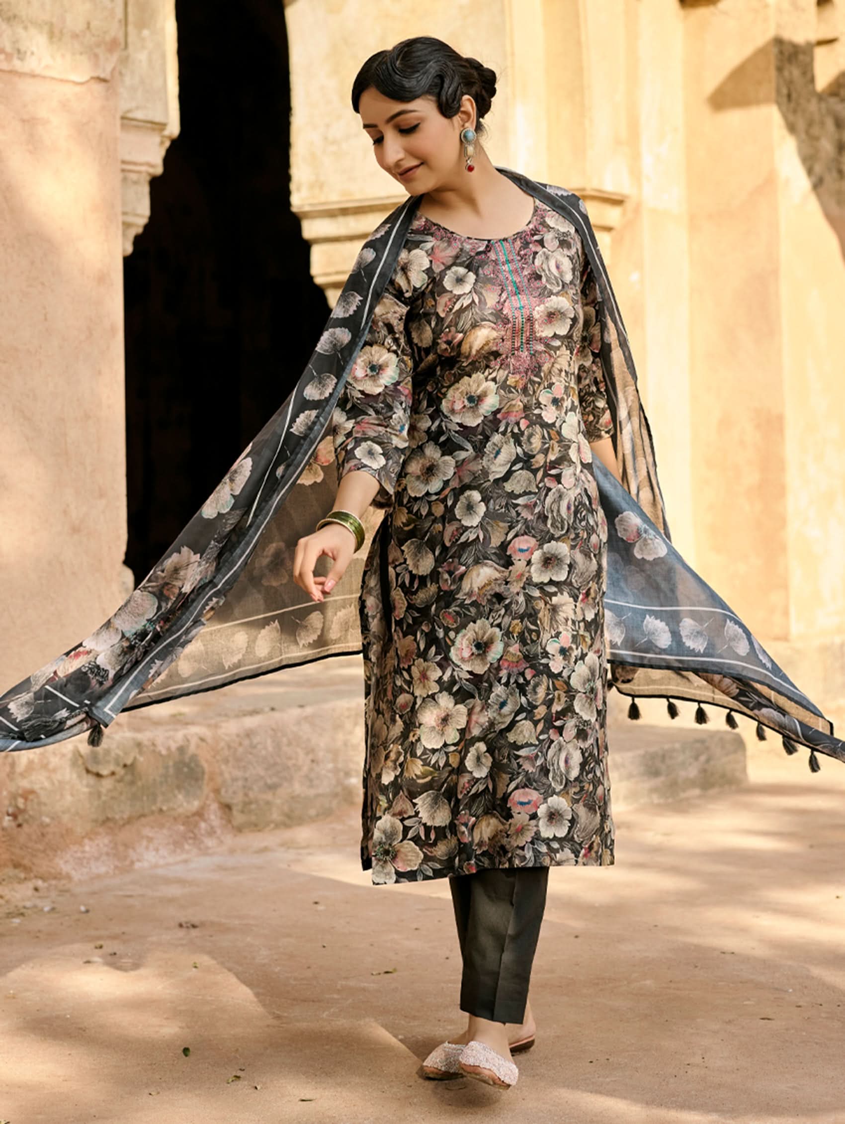 Embroidered long kurta with black floral print and sheer dupatta with tassel trim