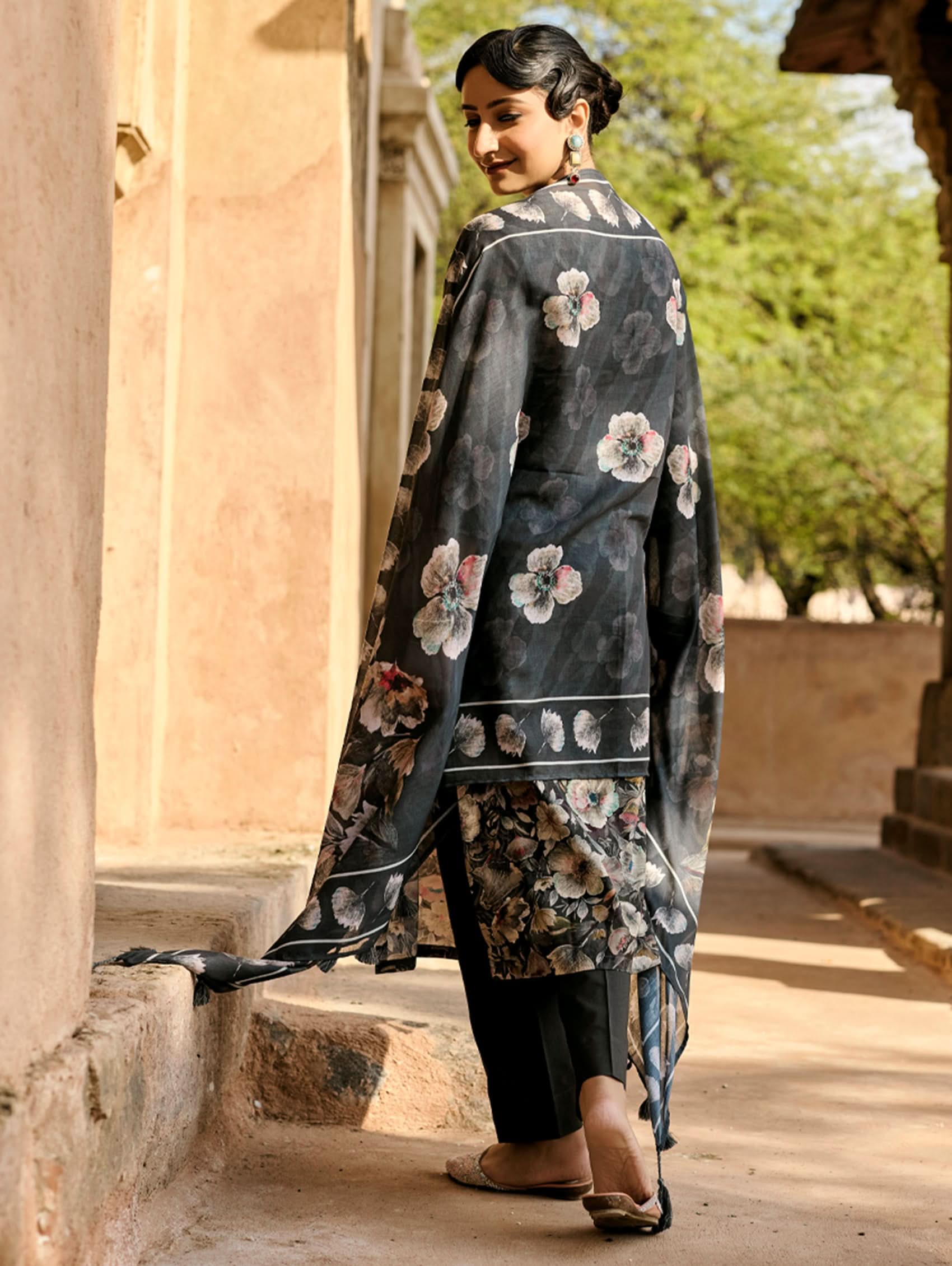Embroidered cotton suit set, dark floral yoke and sheer black dupatta in back view