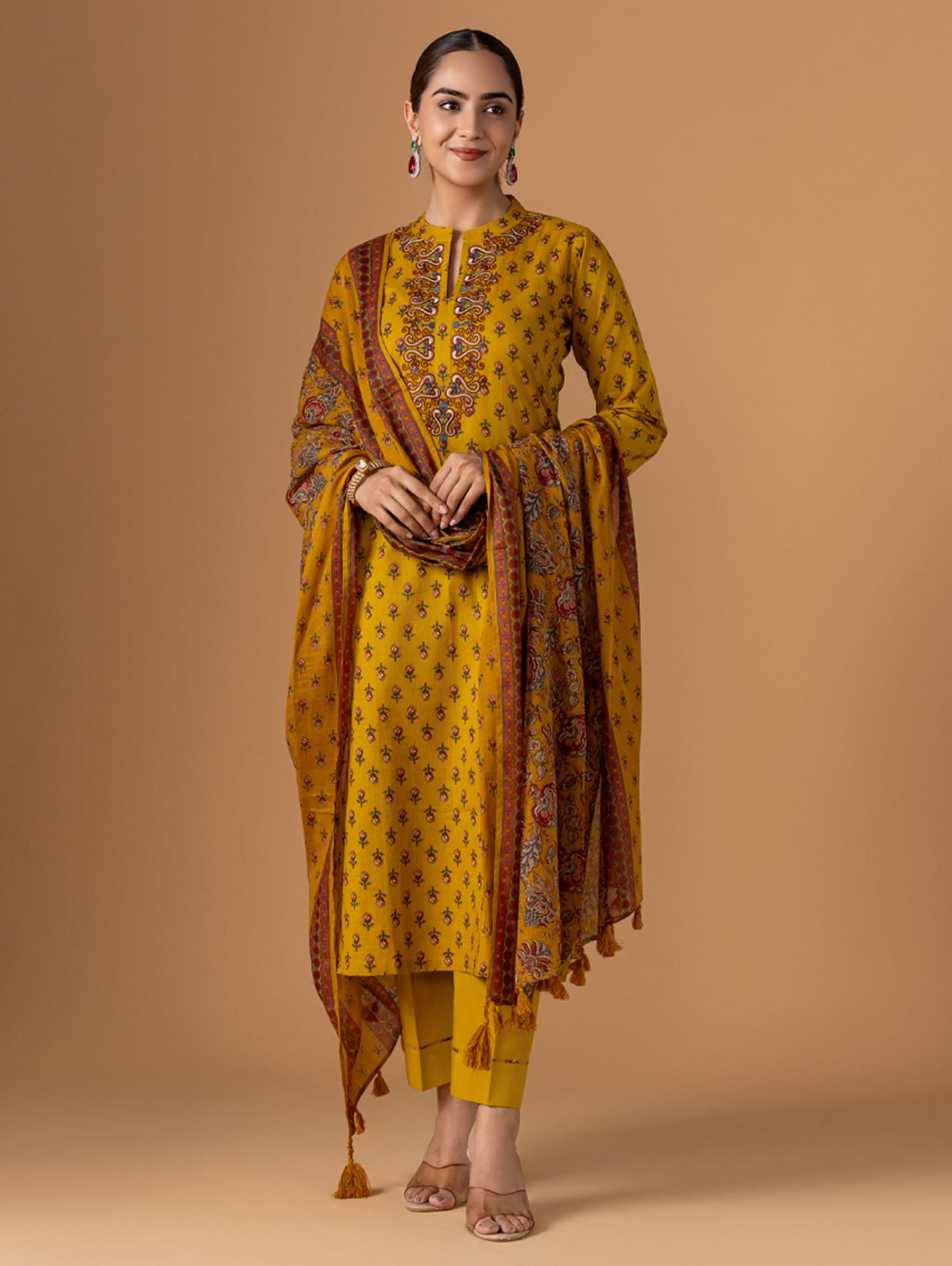 Embroidered yellow cotton suit set: long kurta, matching pants, patterned dupatta