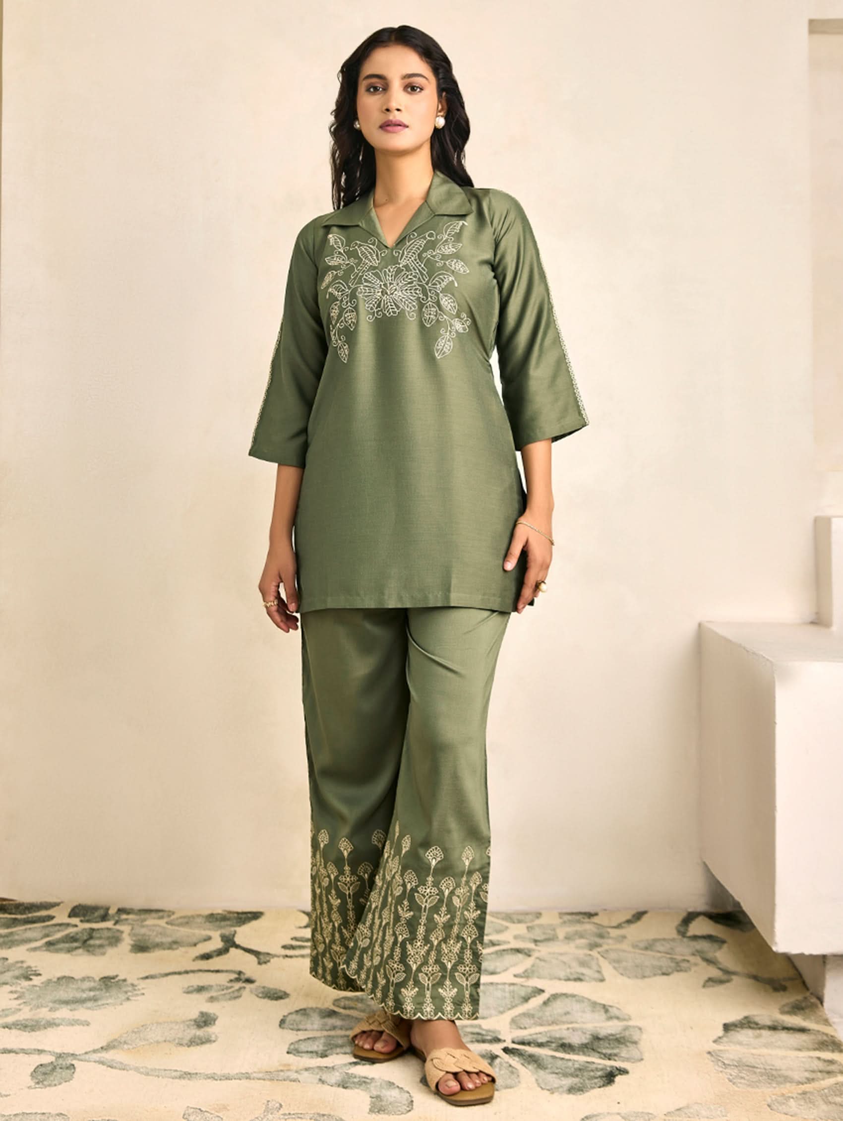 Green embroidered kurta-style top with V-neck and matching wide-leg pants set