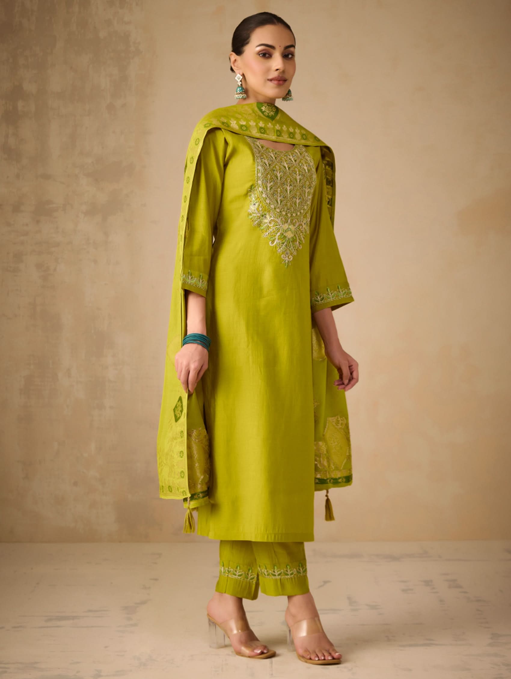 Embroidered lime-green suit set with gold motif front panel and cuffs