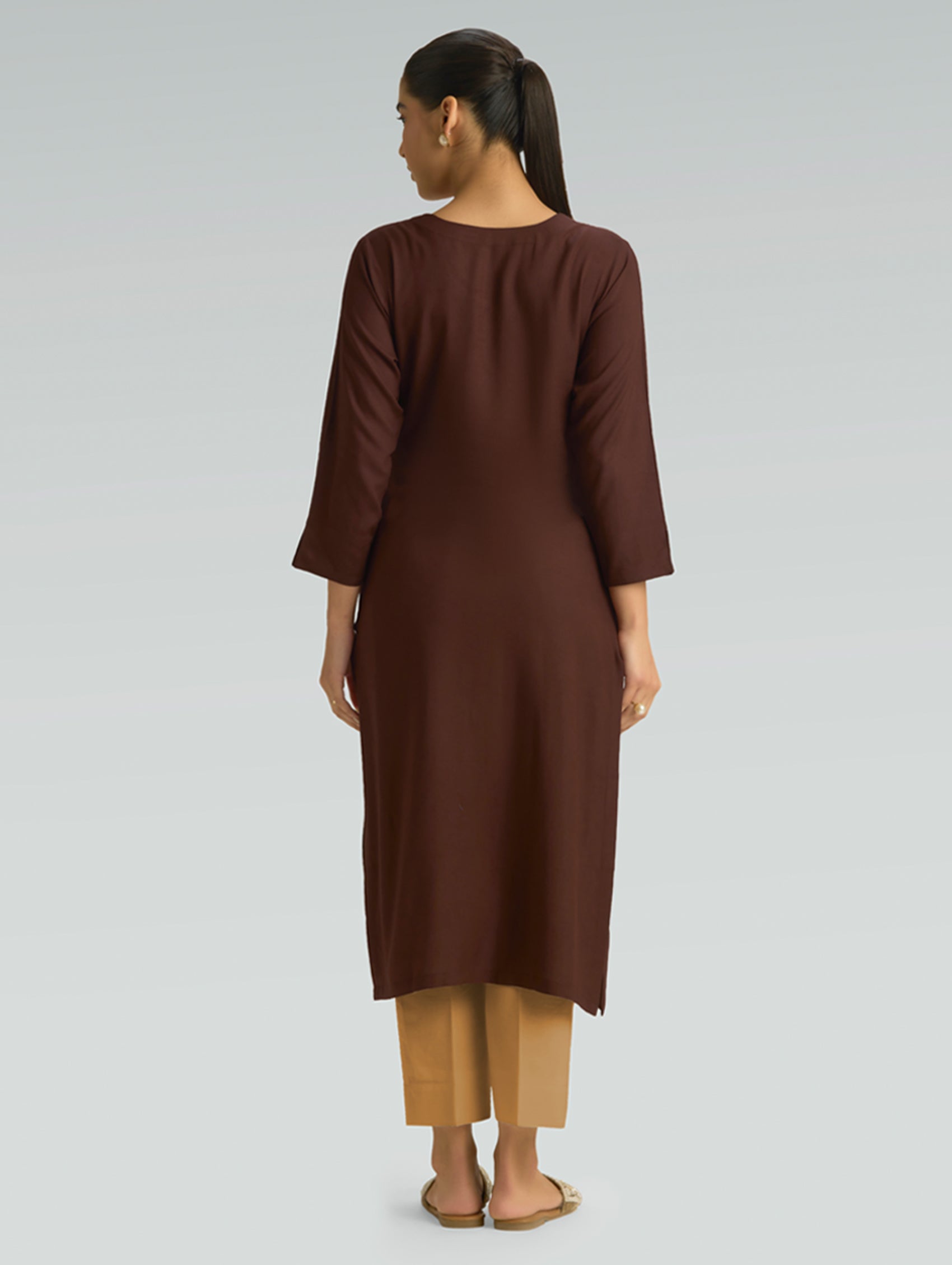 Back view of brown Kurta for Women featuring a plain back design and a comfortable straight-fit silhouette.