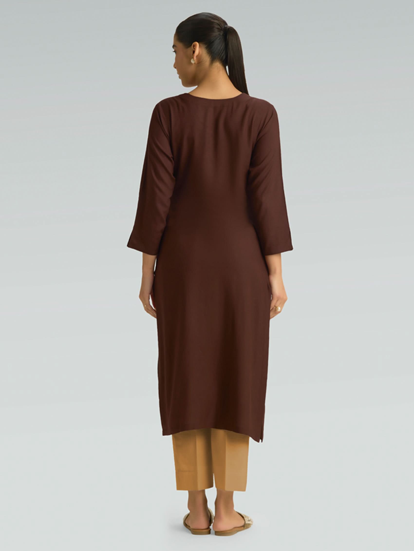 Back view of brown Kurta for Women featuring a plain back design and a comfortable straight-fit silhouette.