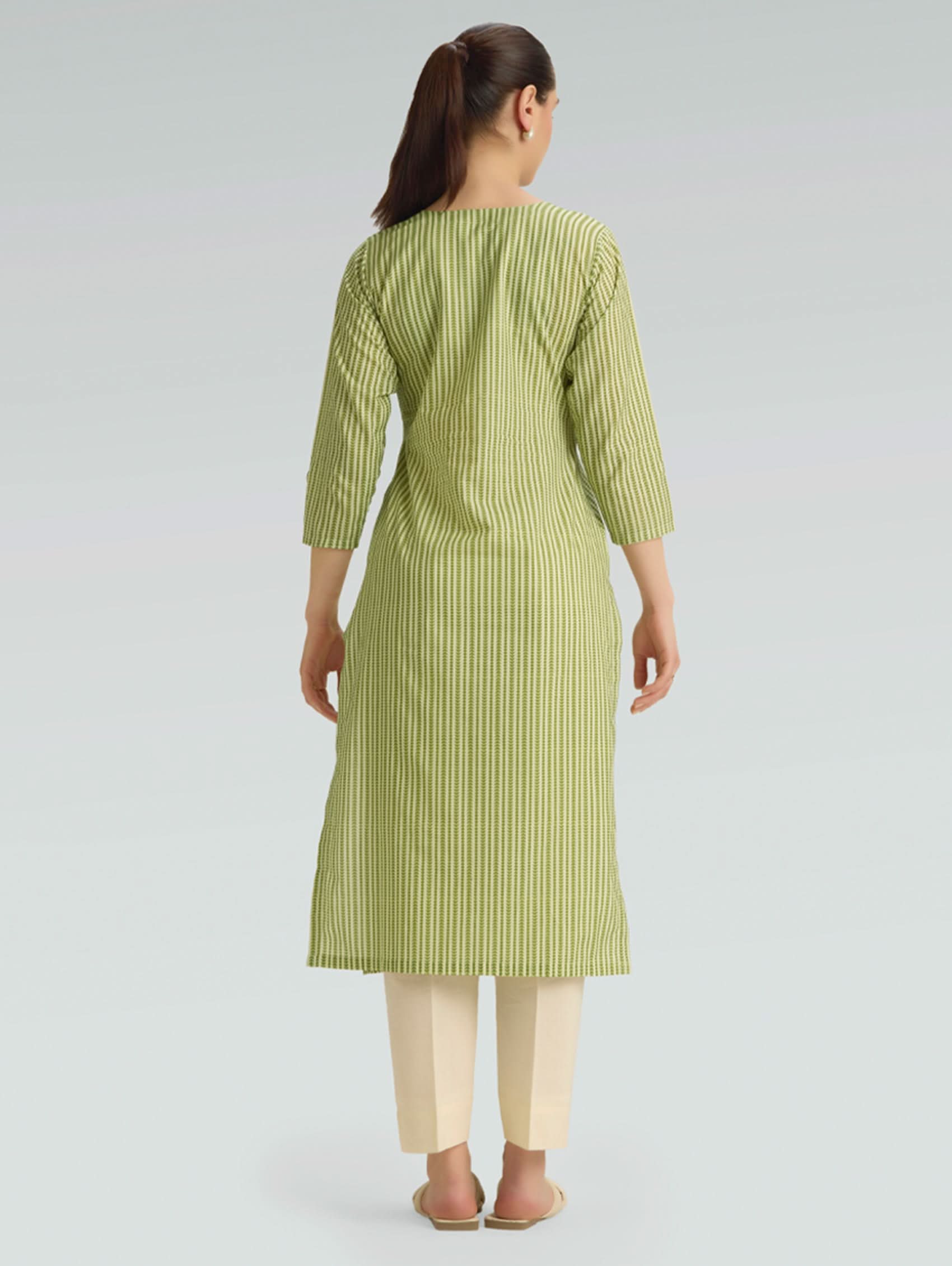 Plus size green printed cotton linen kurta — back view showing straight fit and side slits