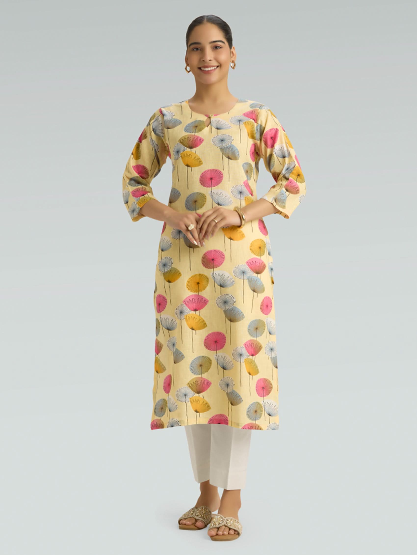 Pale yellow floral printed cotton linen straight-fit kurta for women front view