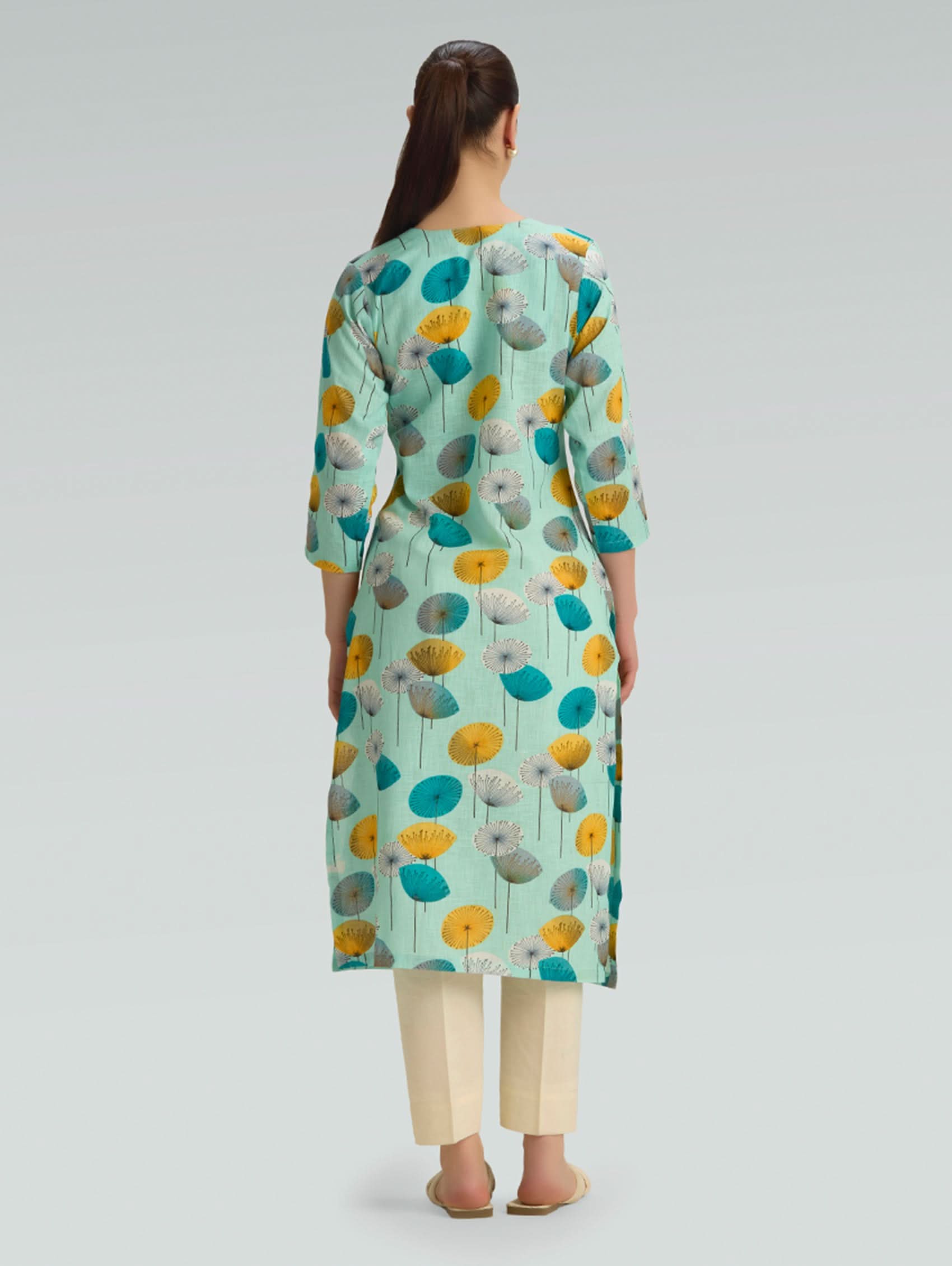 Back view of mint green printed cotton linen kurta with relaxed straight silhouette