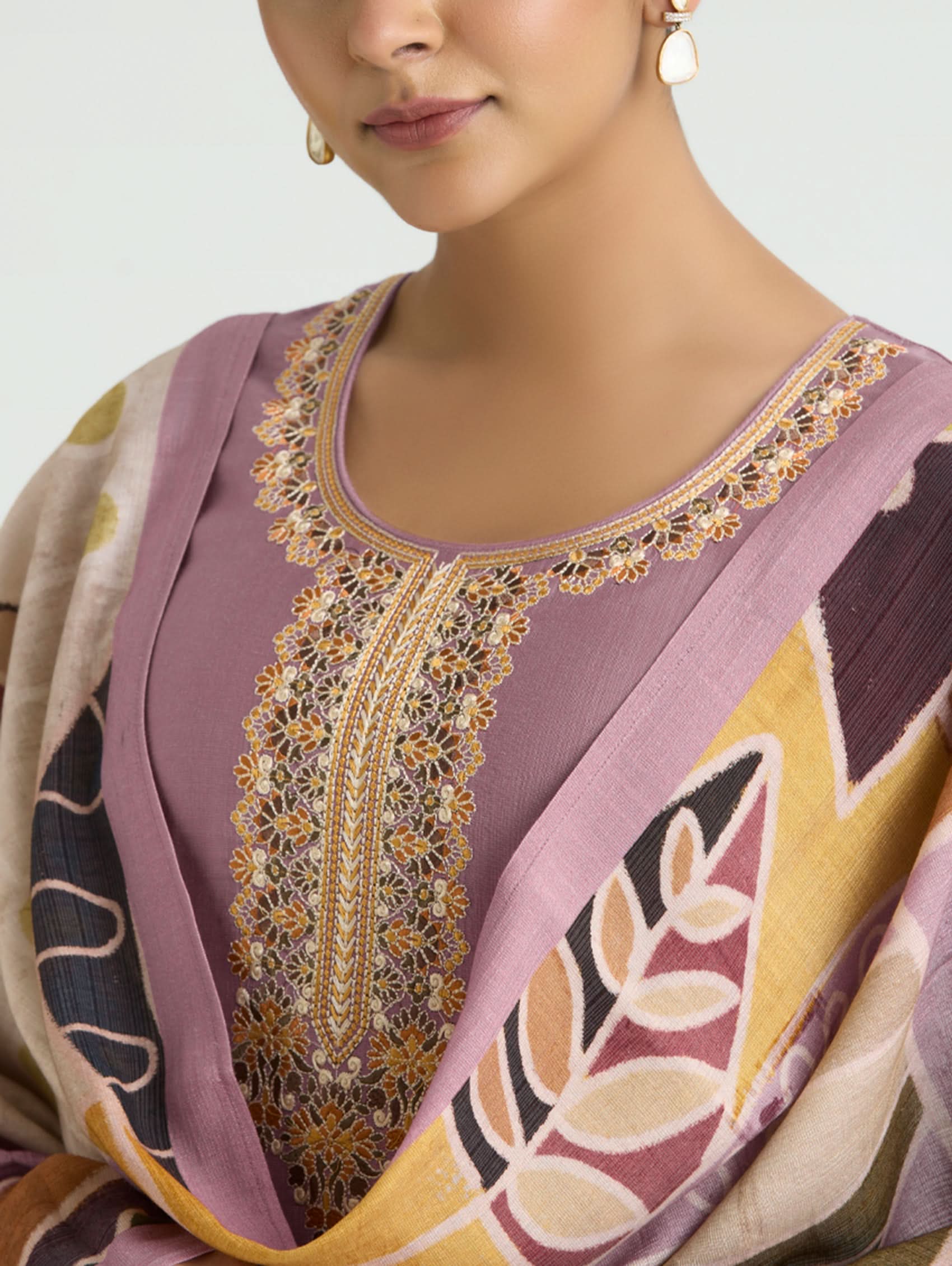 Close-up of a traditional embroidered garment with intricate patterns.