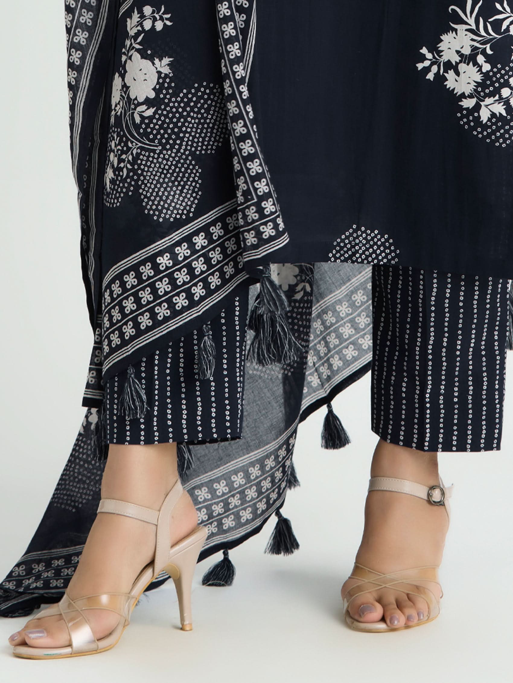 Dark navy blue embroidered cotton suit set with striped leggings and tassel-trim dupatta