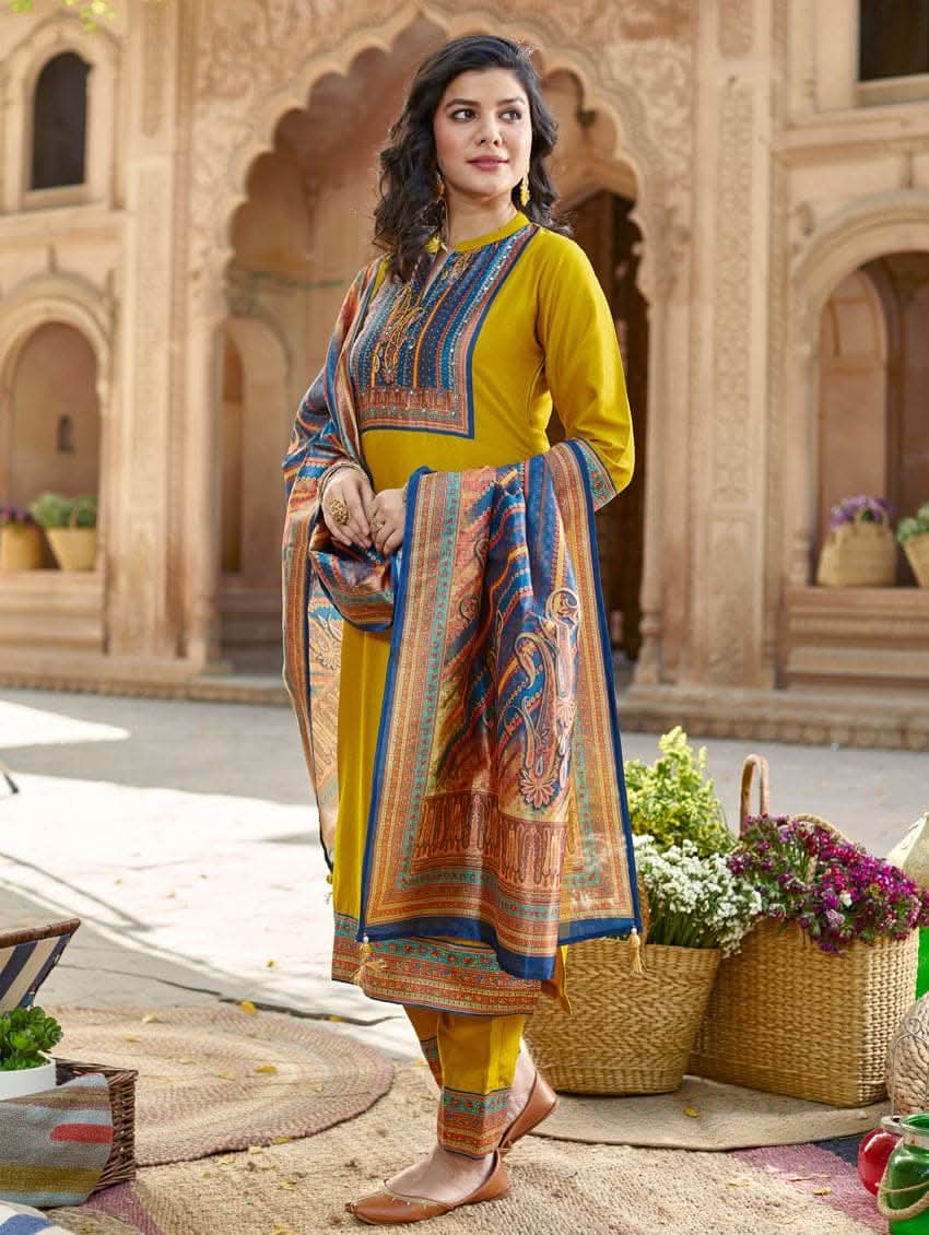 Yellow rayon tunic with blue patterned dupatta and colorful hem trim
