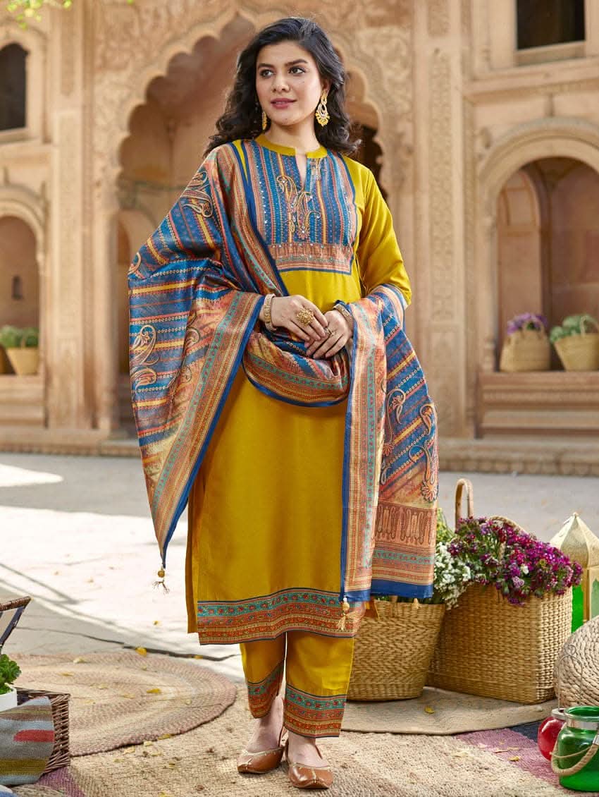 Yellow rayon suit set with blue patterned dupatta draped at front