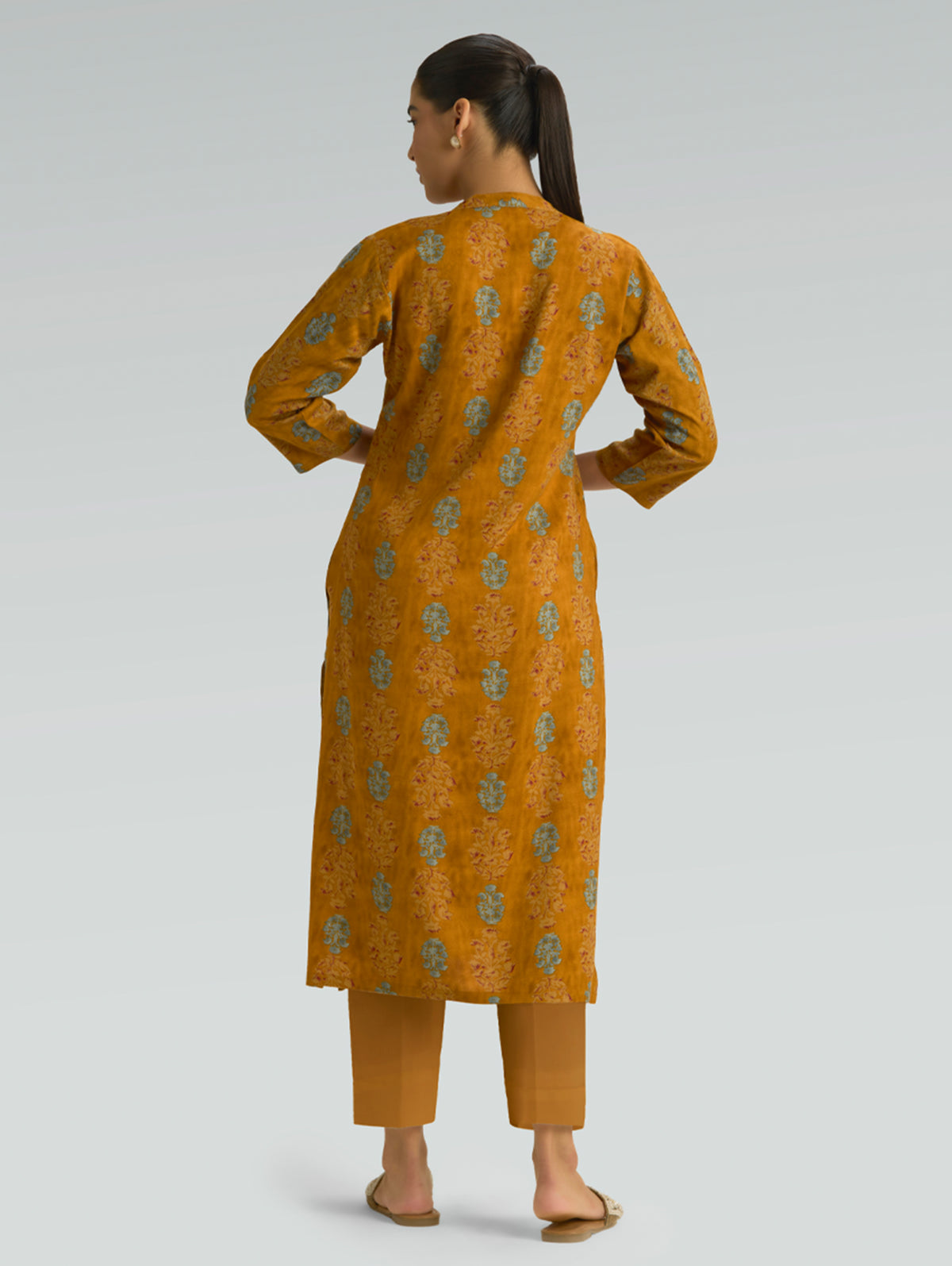 Mustard printed kurta with all-over floral motifs, rounded back neckline, long length