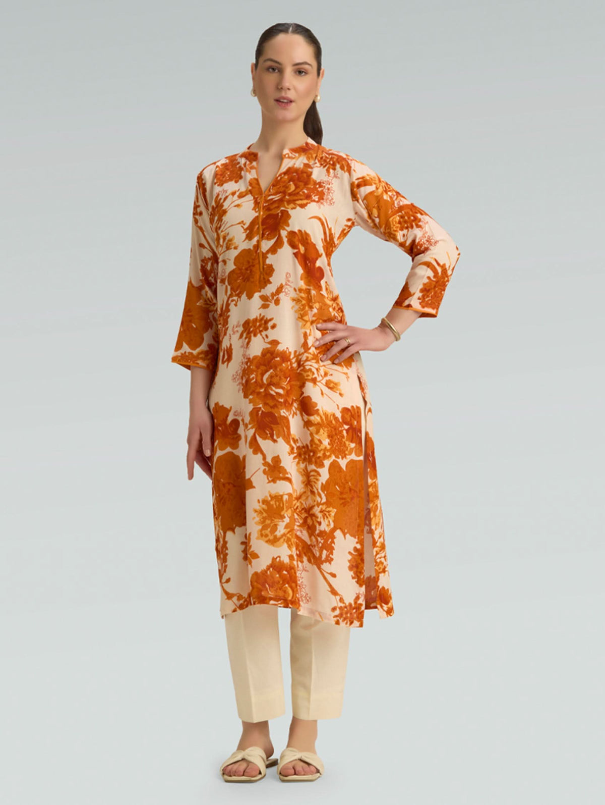 Cream viscose kurta with orange floral print, V-neck, 3/4 sleeves