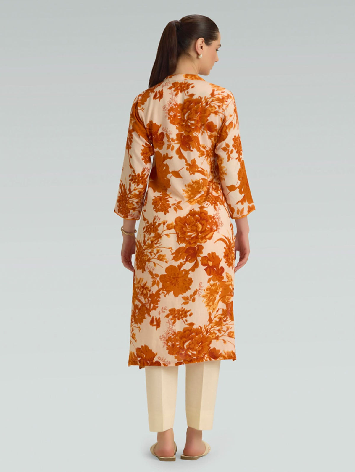 Cream printed kurta with orange floral pattern, back view, 3/4 sleeves