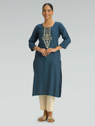 “Straight-fit blue kurta with round collar and computerized thread embroidery on a gray background.”