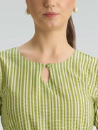 Keyhole neckline detail of plus size green printed cotton linen kurta for women
