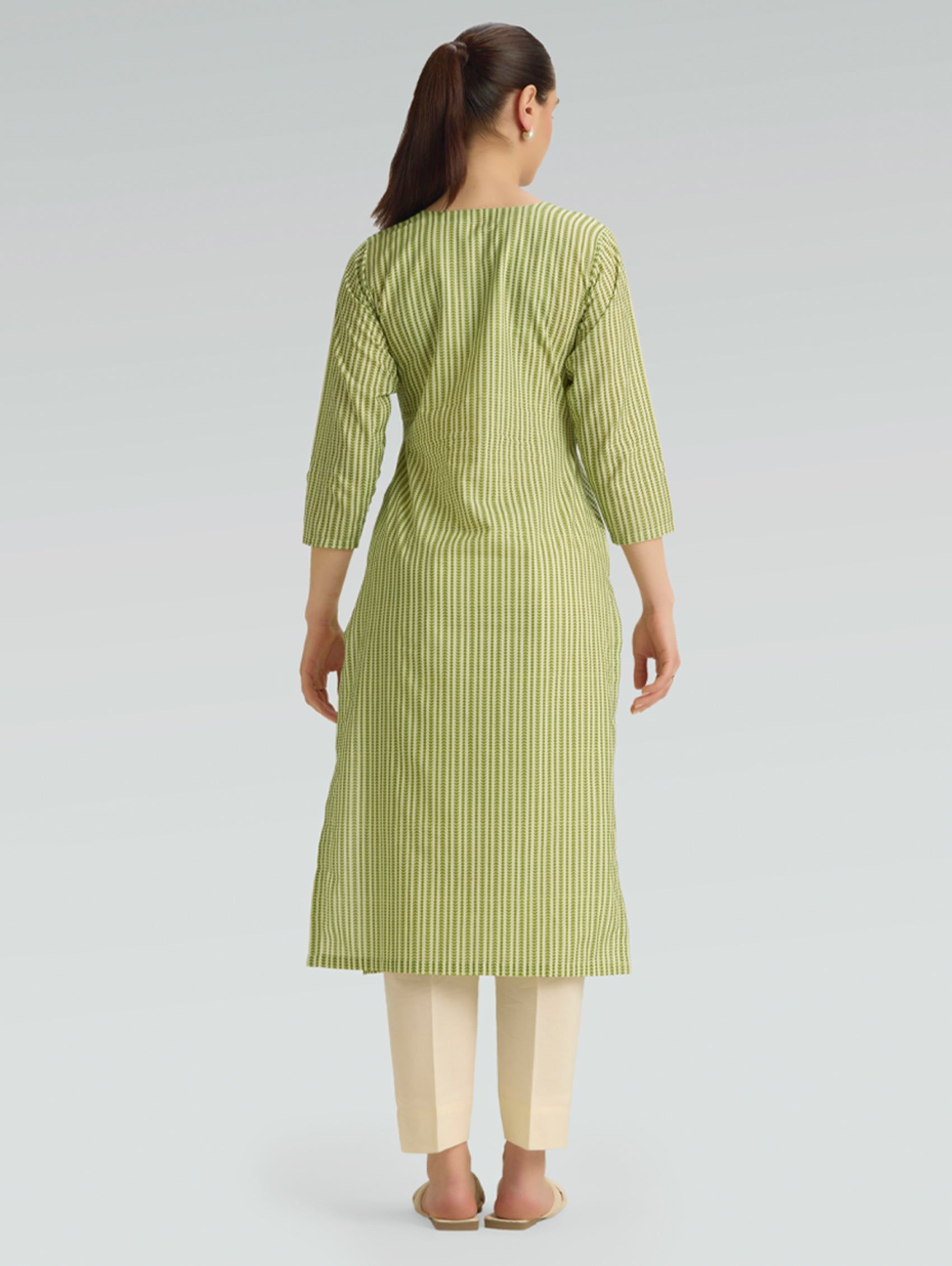 Plus size green printed cotton linen kurta — back view showing straight fit and side slits