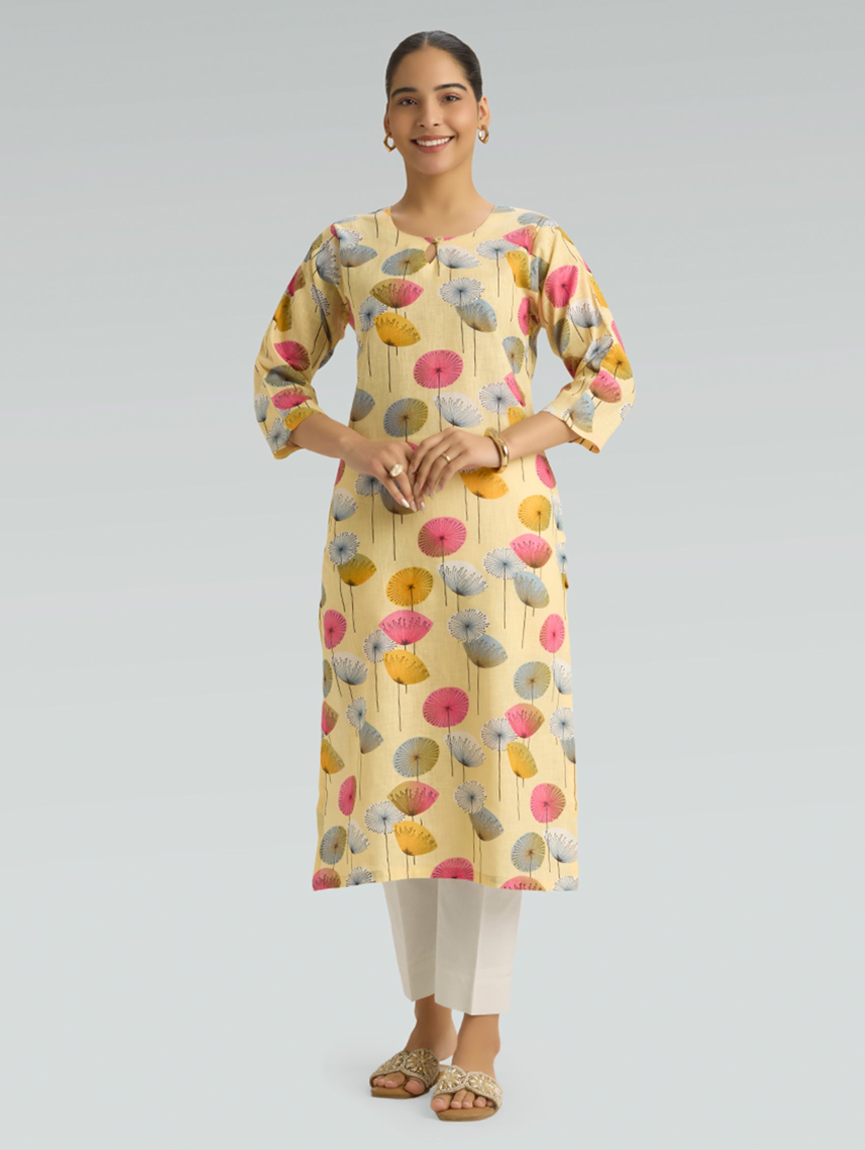 Pale yellow floral printed cotton linen straight-fit kurta for women front view