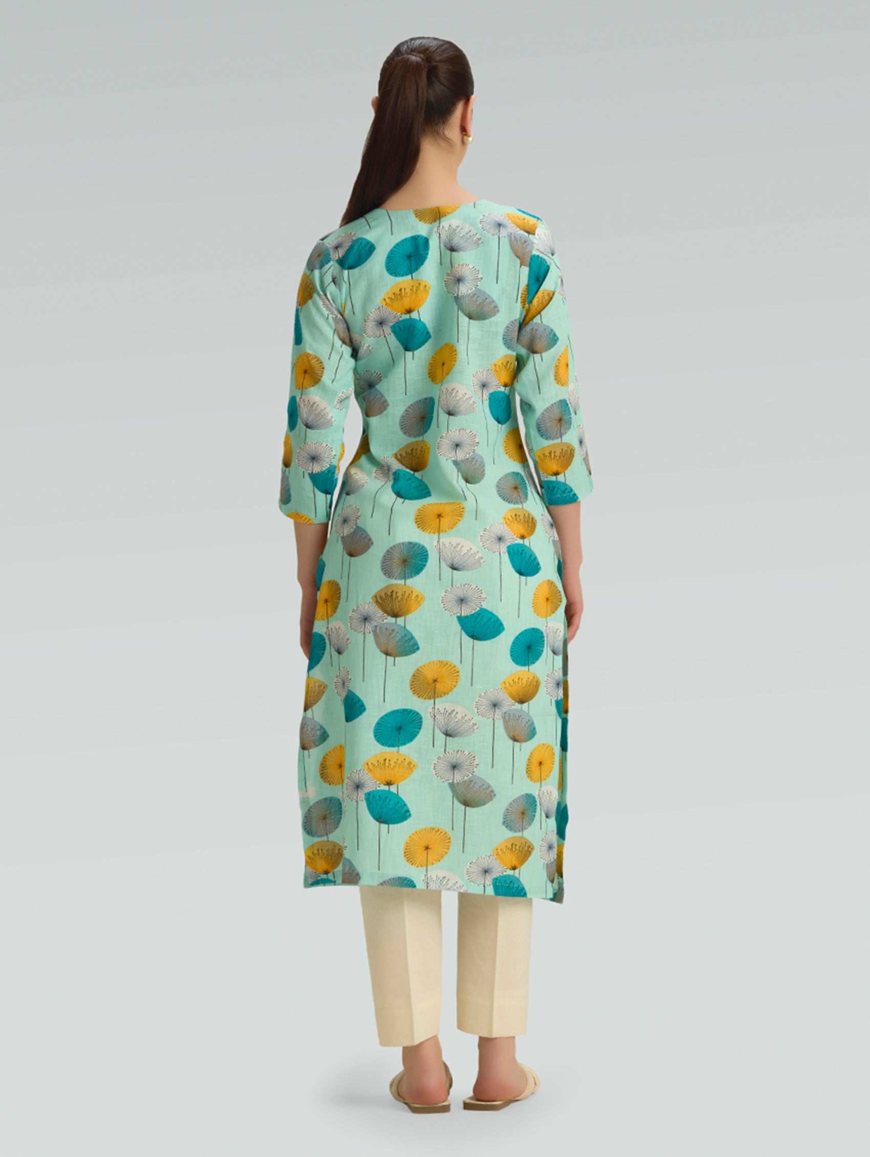 Back view of mint green printed cotton linen kurta with relaxed straight silhouette