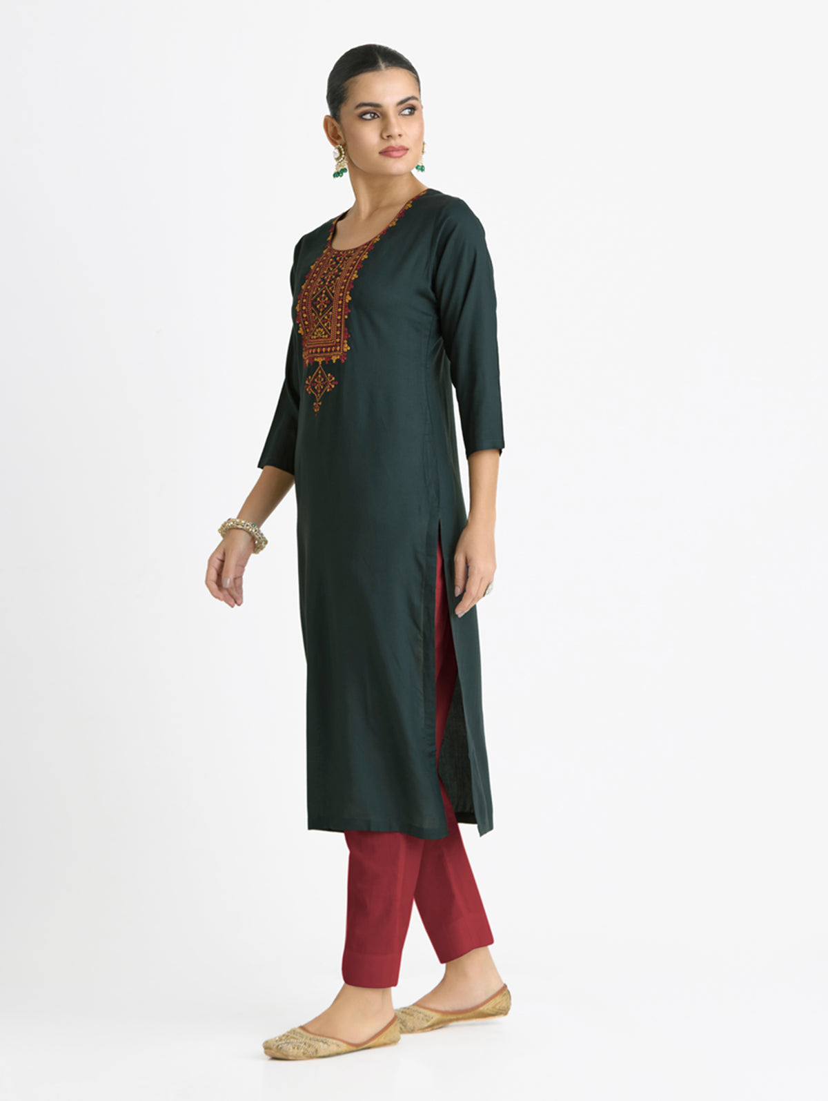 Dark green embroidered kurta front with 3/4 sleeves and curved hem