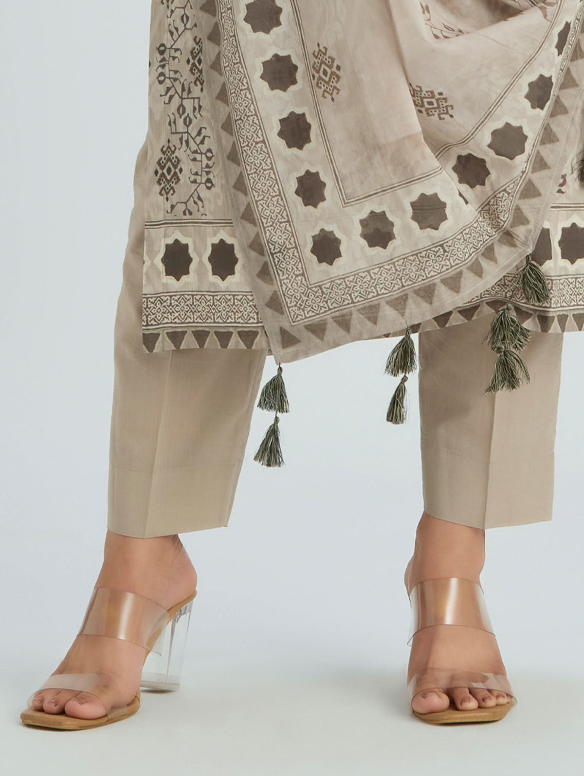 Cotton dupatta border with tassels, beige geometric motifs over light trousers