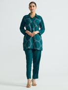 Embroidered teal tunic and matching pants set with cuffed sleeves and button front