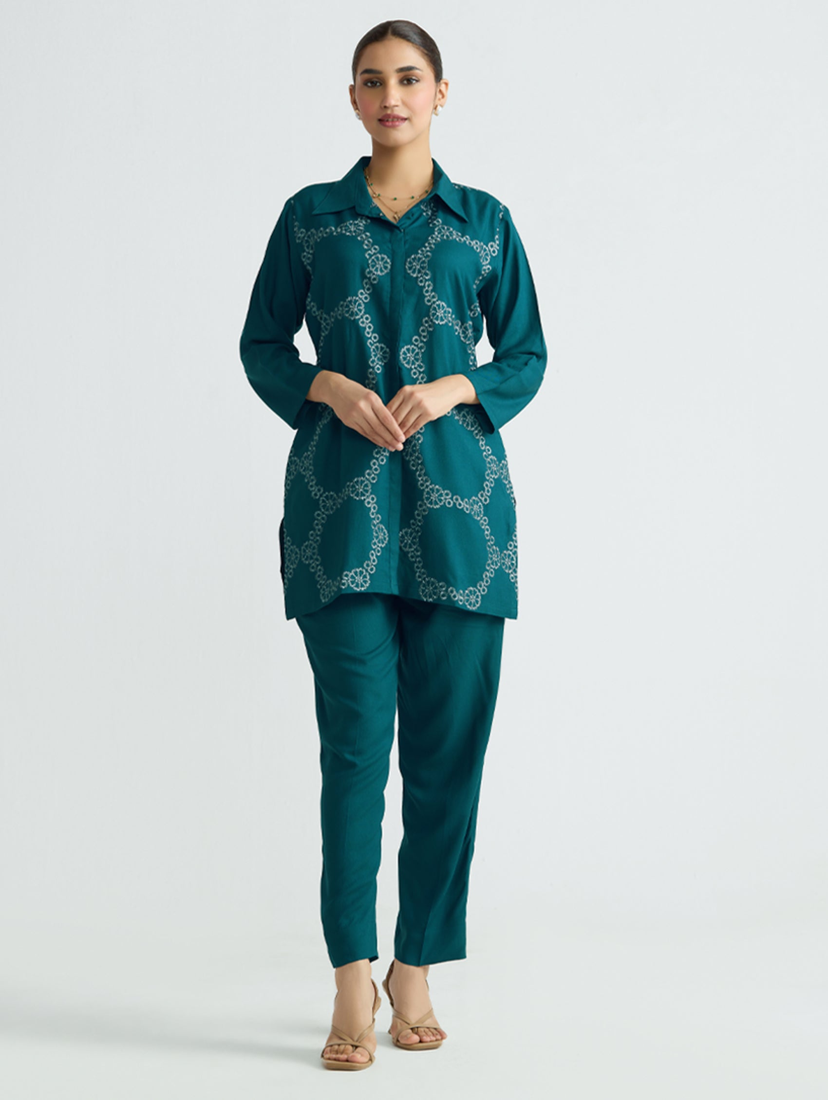 Embroidered teal tunic and matching pants set with cuffed sleeves and button front