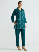 Embroidered teal tunic and tapered pants set with button front and 3/4 sleeves