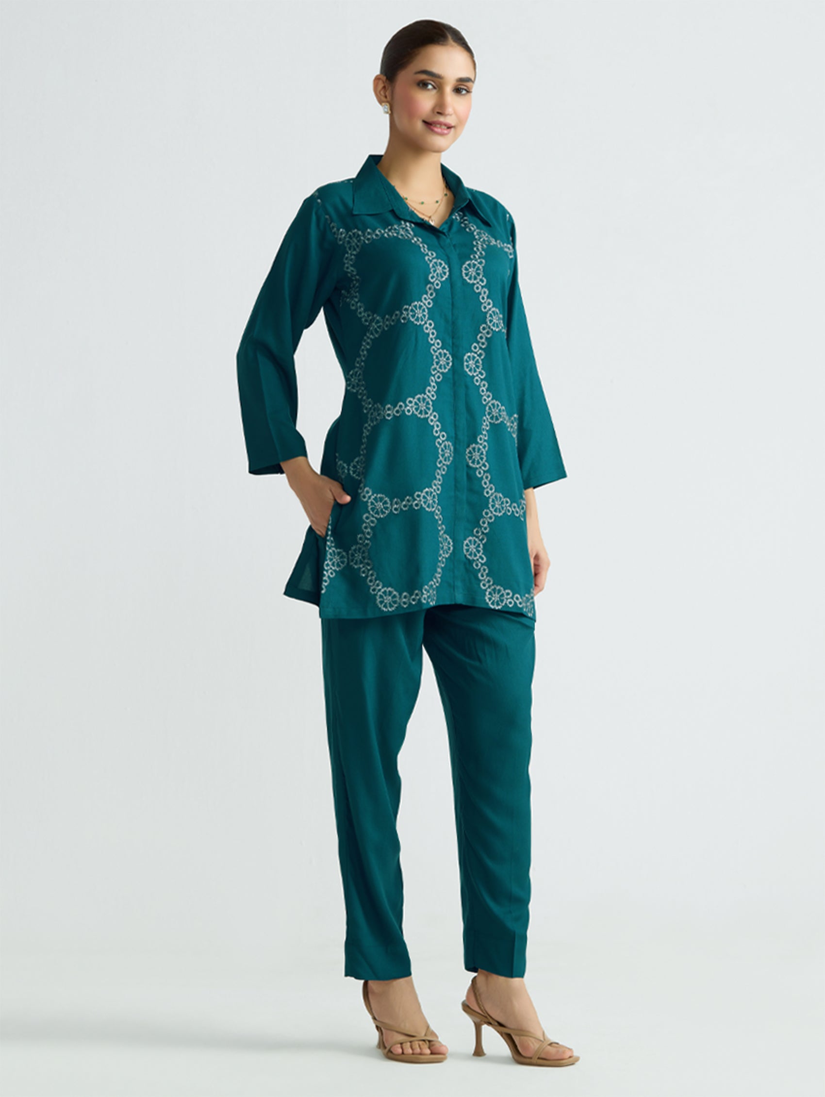 Embroidered teal tunic and tapered pants set with button front and 3/4 sleeves
