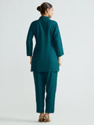 Teal embroidered tunic and matching pants set, back view with 3/4 sleeves